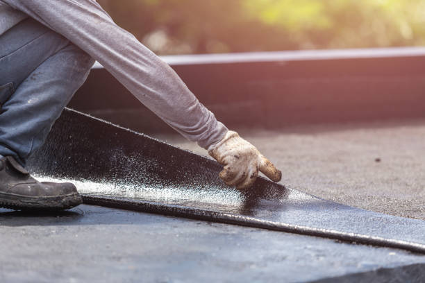 Professional Exterior Waterproofing technician working in New Castle, KY
